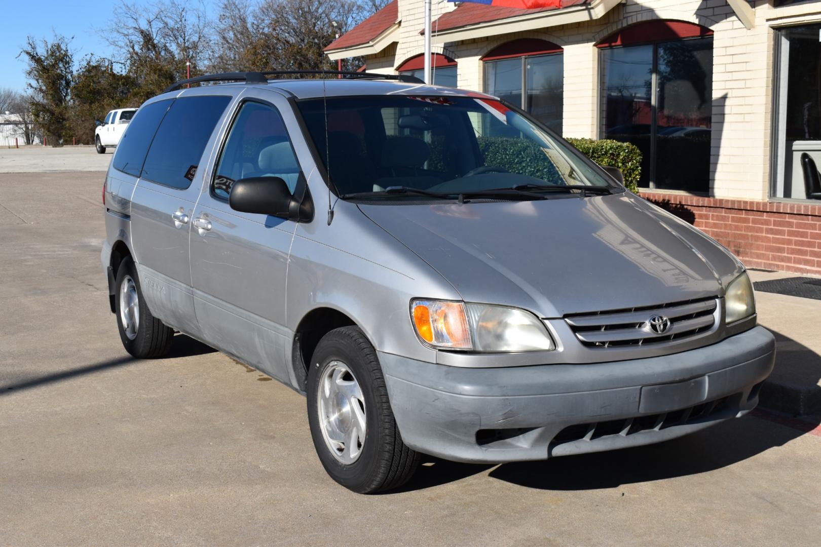2002 Silver /Gray Toyota Sienna LE (4T3ZF13C42U) with an 3.0L V6 DOHC 24V engine, 4-Speed Automatic Overdrive transmission, located at 5925 E. BELKNAP ST., HALTOM CITY, TX, 76117, (817) 834-4222, 32.803799, -97.259003 - Buying a 2002 Toyota Sienna Van/Minivan can be a practical choice for several reasons: Reliability: Toyota vehicles are renowned for their reliability, and the Sienna is no exception. It's known to have a strong engine and durable construction, which means it can last for many miles with proper m - Photo#5